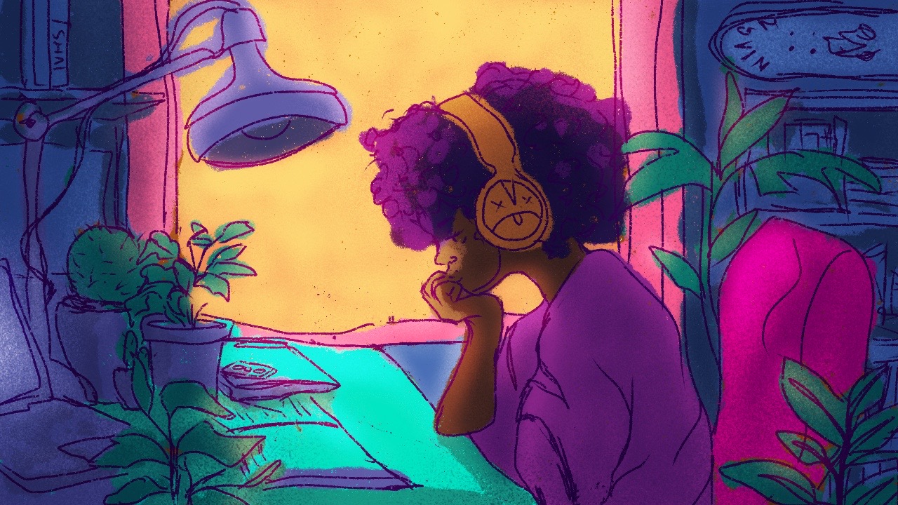 A self portrait of me with an afro. Im wearing headphones  while sitting at a desk writing in a room surrounded by plants. It's sunset.